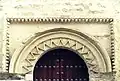 Side door decorated with pointed diamonds