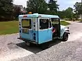 DJ-5 in post USPS with large swinging rear door