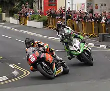 2013 Isle of Man TT&nbsp;Saturday afternoon practice&nbsp;— Bruce Anstey (5), James Hillier (1) & Gary Johnson (7); Parliament Square, Ramsey 1 June 2013.