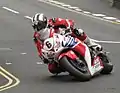 2013 Isle of Man TT&nbsp;Superbike Race Lap 6&nbsp;– Michael Dunlop (6) 1000cc Honda Parliament Square, Ramsey 2 June 2013.