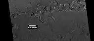 Hollowed out terrain in Deuteronilus Mensae, as seen by HiRISE under HiWish program