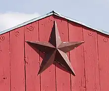 Barnstars are a common element of primitive decorating