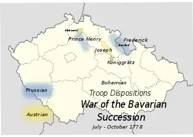 An outline map of 20th century Czechoslovakia includes most of Bohemia; the positions of the armies are marked in yellow and blue, showing Joseph's army (yellow) in a line of fortifications and surrounded at front and rear by Henry and Frederick (blue).