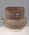 Celadon jar with brown spots, Eastern Jin, 317-420 CE.