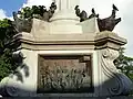 Closeup of one of the plaques of the Columbus column.