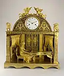 Clock; 1807-1810; fire-gilt bronze, blackened bronze, enameled metal (dial), blued steel (hands); glass; 56 x 49.7 x 18.5&nbsp;cm; Cooper Hewitt, Smithsonian Design Museum (New York City)