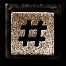 A closeup of a telephone button with the pound sign (#).