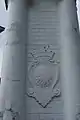 Crest of the Singapore Municipal Commission on a gatepost of the former Bidadari Cemetery