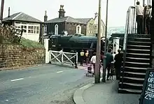 Helmshore railway station in 1970, looking west along Helmshore Road with the signal box (left)
