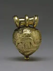 Bulla with Daedalus and Icarus; 5th century BC; gold; 1.6 by 1 by 1 centimetre (0.63&nbsp;in ×&nbsp;0.39&nbsp;in ×&nbsp;0.39&nbsp;in); Walters Art Museum (Baltimore)