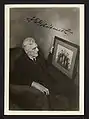6. Fred Goldsmith Photo of himself looking at the Chicago White Stockings team photo.&nbsp;&nbsp;&nbsp;&nbsp;&nbsp;(late 1930s)