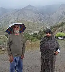 A family in sar hanayan lane gajge poshtkuh