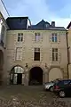 Hôtel de  Brie from the service yard. The passage under the building became the bike shed and storage bins.