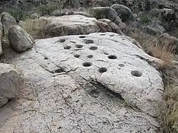 Bedrock mortars at Huerfano Butte.
