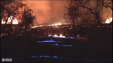 Blue flames from burning methane gas in Leilani Estates, on 22 May 2018, 11:30&nbsp;p.m. HST.