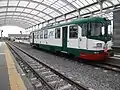 The ADe 18, named "La Prima" on occasion of its revamping, parked at the FCE Adrano Nord station.