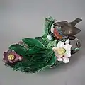 Candle Holder, 1870, coloured glazes, naturalistic in style.