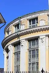 Allegorical figures on the exterior of the rotunda, National Library of Finland, with fellow sculptor Karl Magnus Mellgren&nbsp;[fi], 1905