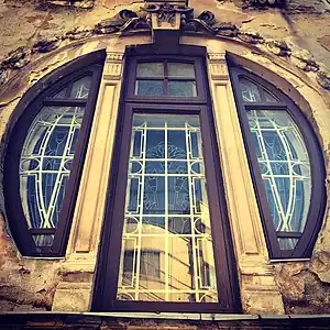 Mixed with Art Nouveau - Stained glass window of the Romulus Porescu House, decorated with lotus flowers, Bucharest, Romania, 1905, by Dimitrie Maimarolu