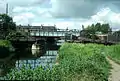 The Sheepwash Channel with the old swing bridge and the newer railway bridge.