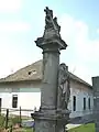Sculpture in front of the Catholic Church.