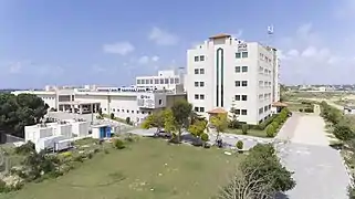 A look at the southern entrance of the Turkish-Palestinian Friendship Hospital and the IUG Faculty of Medicine. The TIKA logo can be seen on the main entrance.
