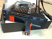 A dual-HDD rack, made as a 5.25-inch-bay device capable of simultaneously holding a 2.5-inch and a 3.5-inch SATA HDD, with two additional USB&nbsp;3.0 ports