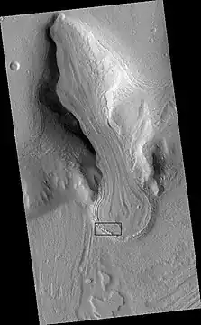 Possible glacier flowing down a valley and spreading out on a plain. Rectangle shows a portion that is enlarged in the next image.