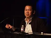 A 2011 photograph of Yu Suzuki
